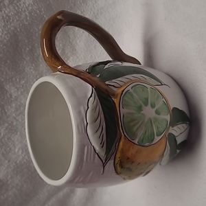 - H51: HAND PAINTED LEMON WITH LEAVES MUG